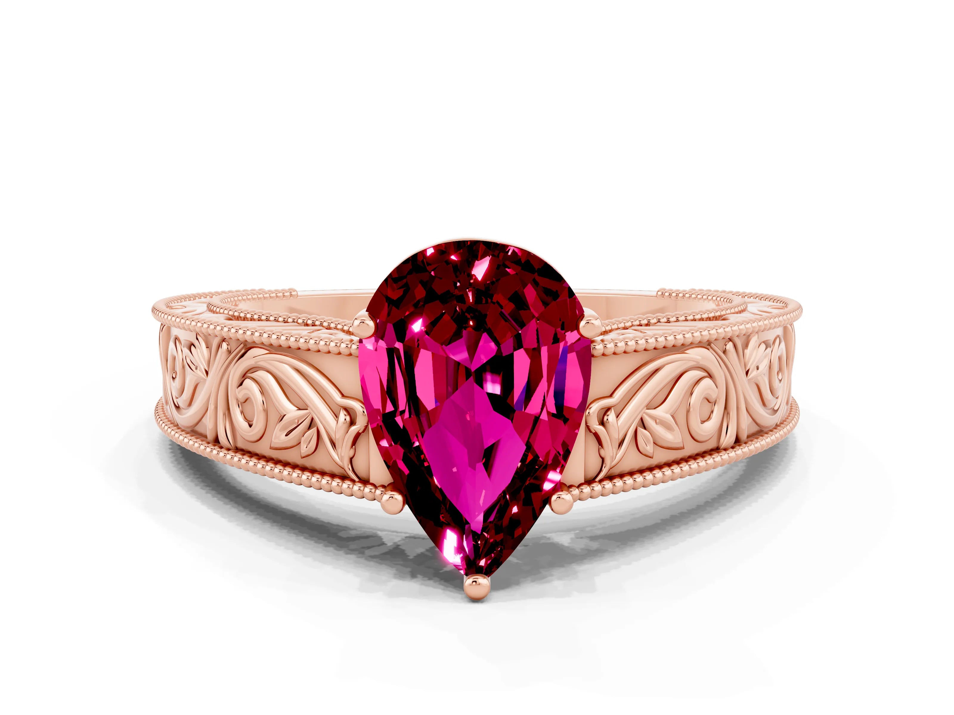 Rose gold Pear Cut Garnet Solitaire Ring with Engraved Band and Four-Prong Setting