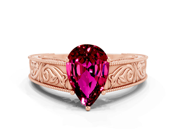 Rose gold Pear Cut Garnet Solitaire Ring with Engraved Band and Four-Prong Setting