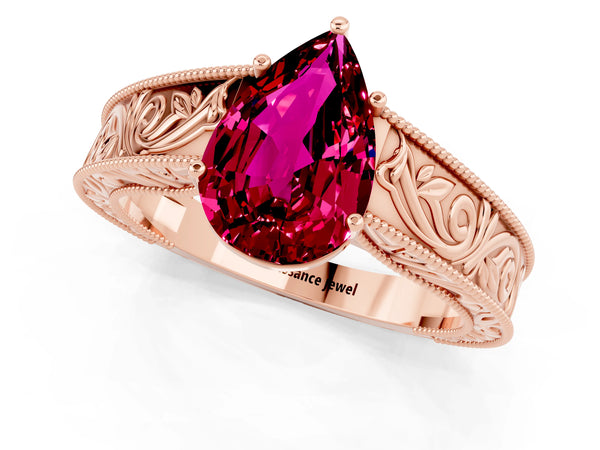 Rose gold Pear Cut Garnet Solitaire Ring with Engraved Band and Four-Prong Setting