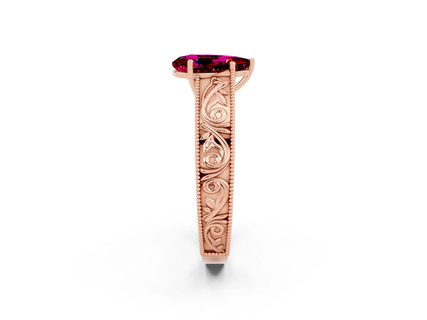 Rose gold Pear Cut Garnet Solitaire Ring with Engraved Band and Four-Prong Setting