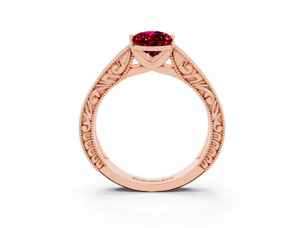Rose gold Pear Cut Garnet Solitaire Ring with Engraved Band and Four-Prong Setting