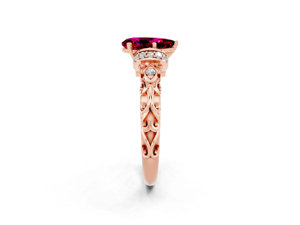 Rose gold Pear Cut Garnet Solitaire Ring with Filigree Band and Four-Prong Setting