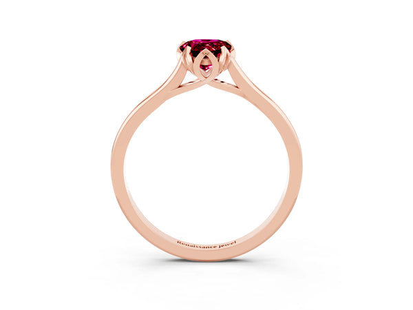 Rose gold Pear Cut Garnet Solitaire Ring with Flower Prong Setting and Classic Band
