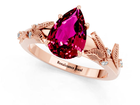 Rose gold Pear Cut Garnet Solitaire Ring with Leaf Motif Band and Four-Prong Setting_1