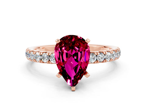 Rose gold Pear Cut Garnet Solitaire Ring with Pavé Accents and Four-Prong Setting