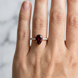 Rose gold Pear Cut Garnet Solitaire Ring with Round  Pavé Band and Four-Prong Setting_30