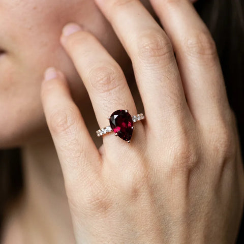 Rose gold Pear Cut Garnet Solitaire Ring with Round  Pavé Band and Four-Prong Setting_32