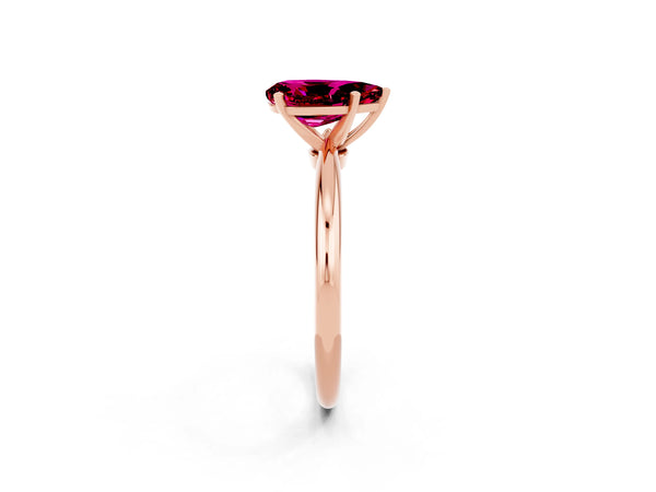 Rose gold Pear Cut Garnet Solitaire Ring with Six-Prong Setting and Classic Band