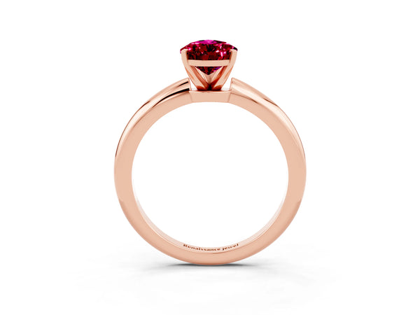 Rose gold Pear Cut Garnet Solitaire Ring with Six-Prong Setting and Classic Band