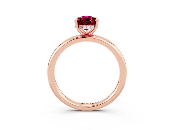 Rose gold Pear Cut Garnet Solitaire Ring with Thin Band and Four-Prong Setting
