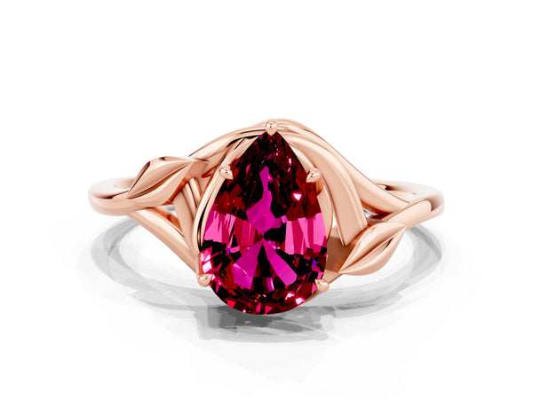 Rose gold Pear Cut Garnet Solitaire Ring with Twist Band and Four-Prong Setting