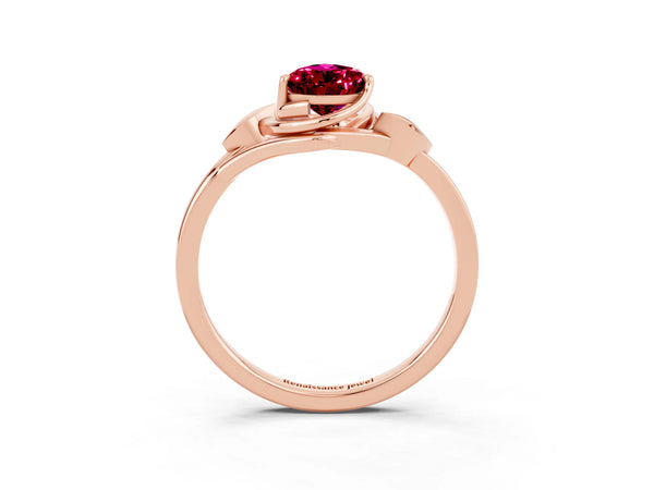Rose gold Pear Cut Garnet Solitaire Ring with Twist Band and Four-Prong Setting