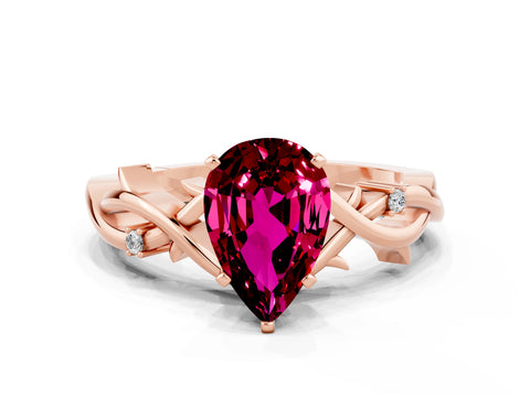 Rose gold Pear Cut Garnet Solitaire Ring with Twisted Band and Prong Setting