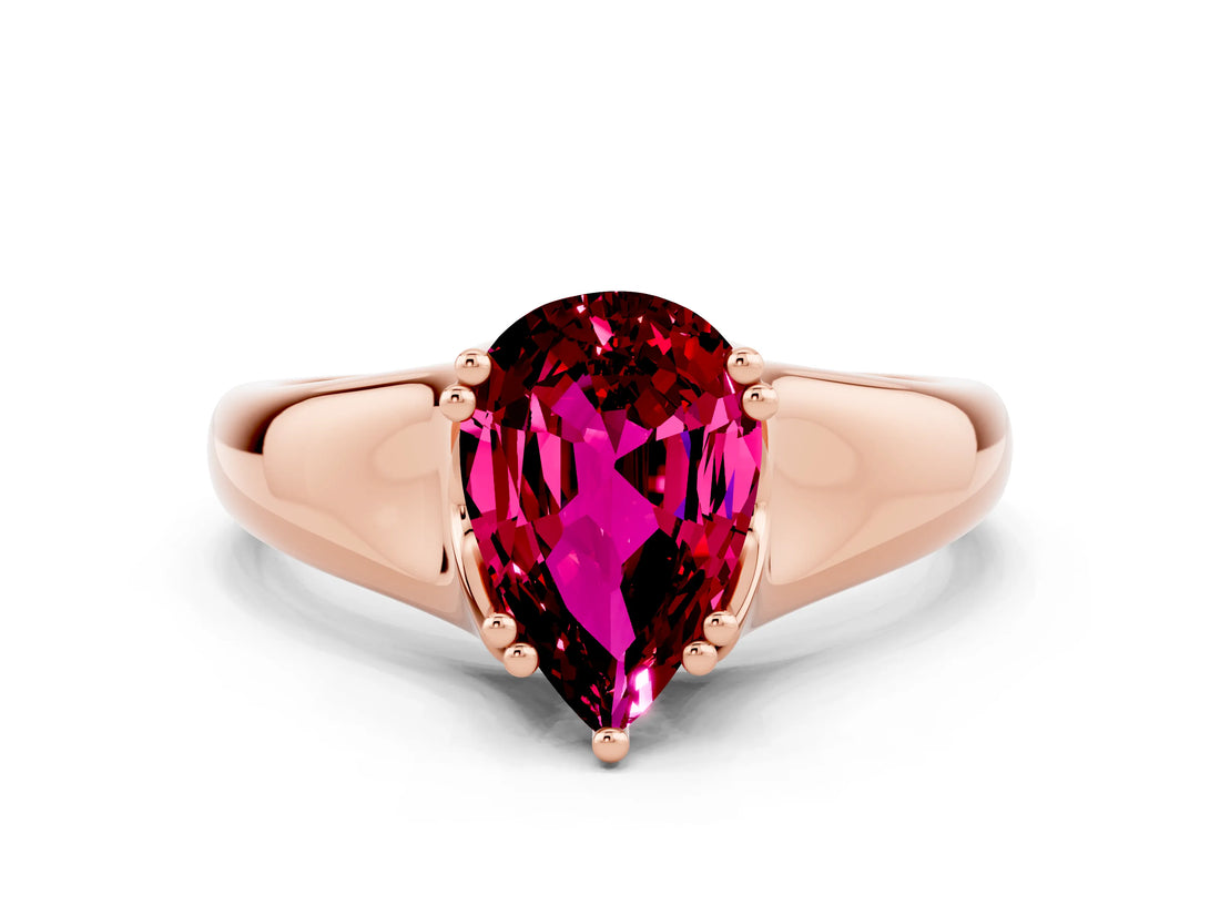 Rose gold Pear Cut Garnet Solitaire Ring with Wide Band and Prong Setting