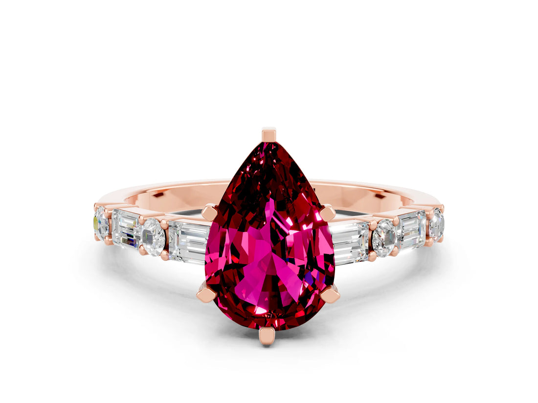 Rose gold Pear Cut Garnet Solitaire with Side Baguettes and Channel Set Band