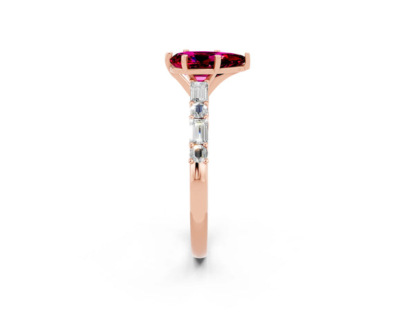 Rose gold Pear Cut Garnet Solitaire with Side Baguettes and Channel Set Band
