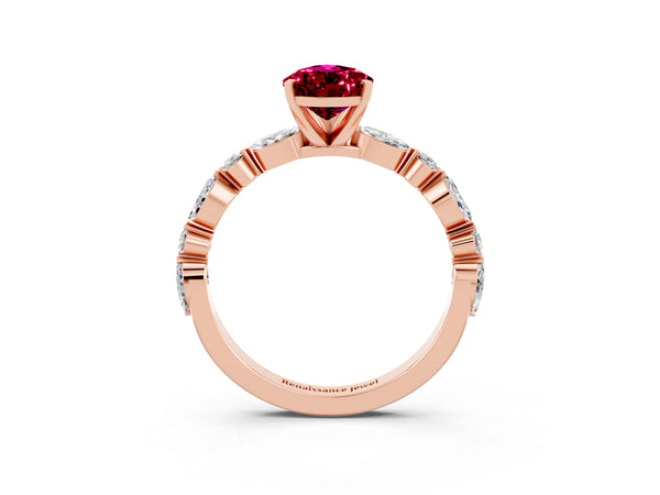 Rose gold Pear Cut Garnet Ring with Marquise and Round  Side Stones and Four-Prong Setting