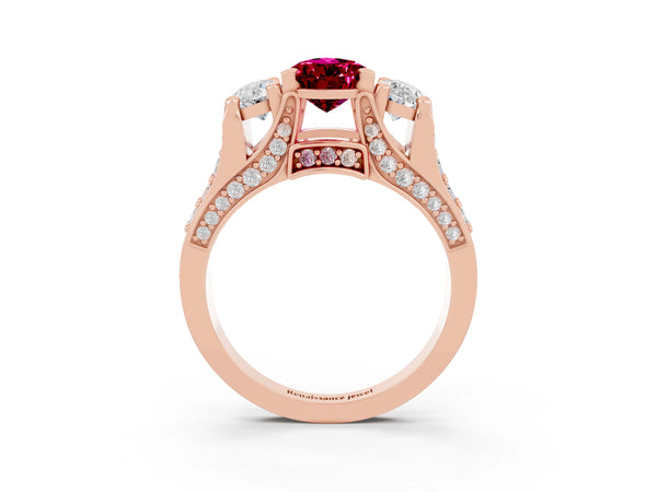 Rose gold Pear Cut Garnet Three-Stone Ring with Channel Set Band and Four-Prong Setting