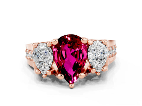 Rose gold Pear Cut Garnet Three-Stone Ring with Channel Set Band and Four-Prong Setting