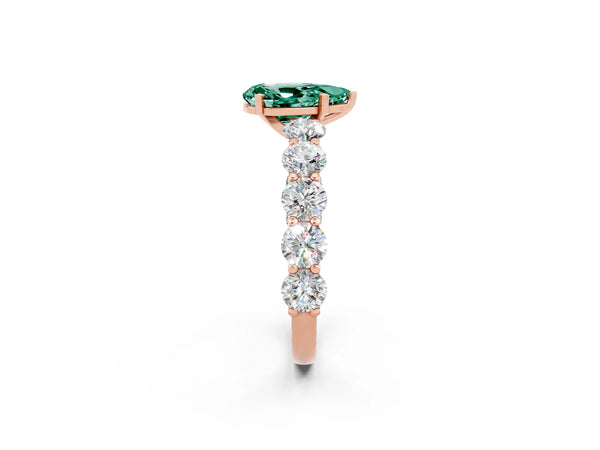 Rose gold Pear Cut Green Sapphire Prong Setting with Side Stones on a Pave Band