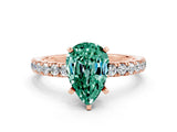 Rose gold Pear Cut Green Sapphire Solitaire Ring with Pavé Accents and Four-Prong Setting