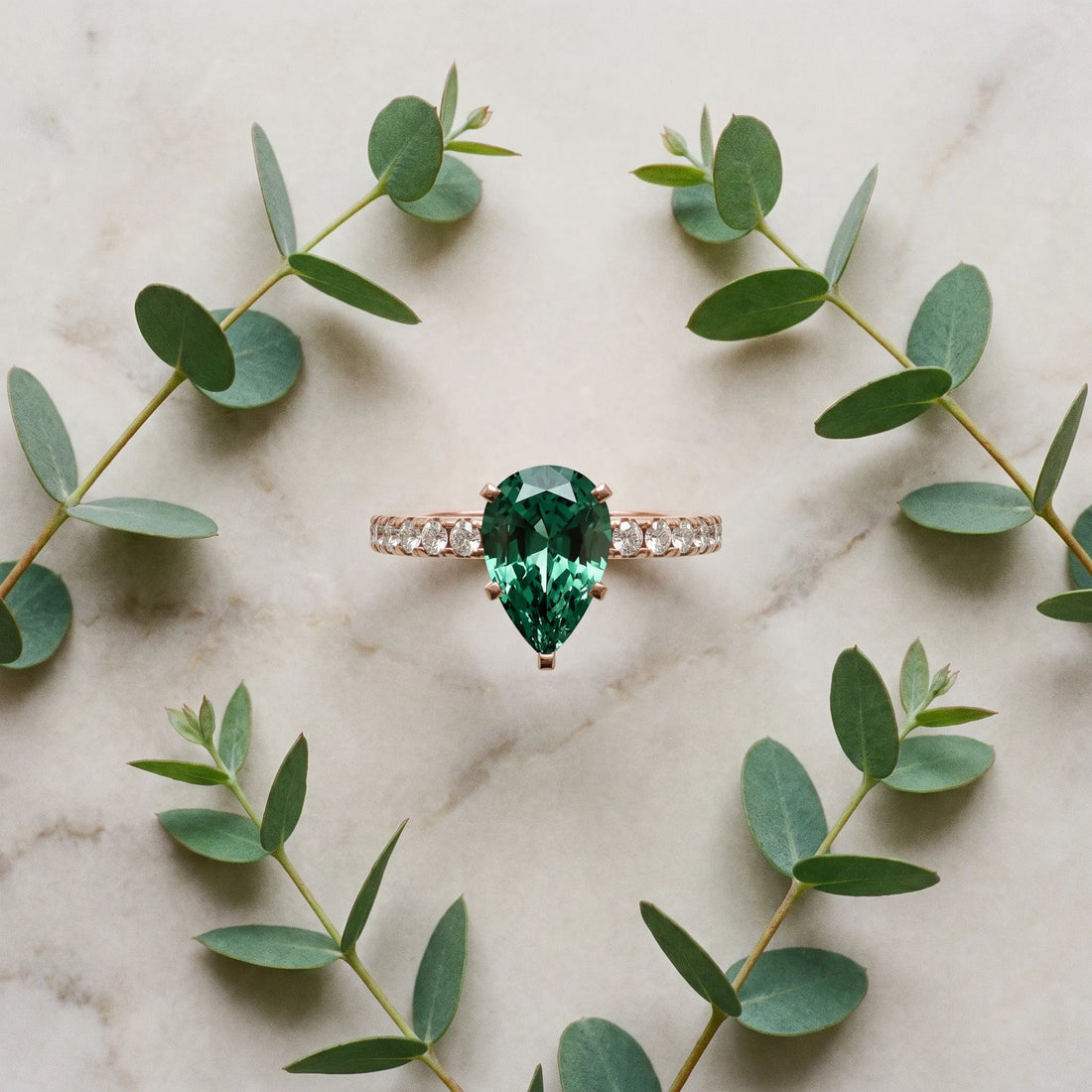 Rose gold Pear Cut Green Sapphire Solitaire Ring with Round  Pavé Band and Four-Prong Setting_45