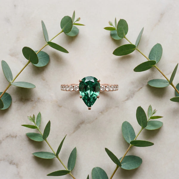 Rose gold Pear Cut Green Sapphire Solitaire Ring with Round  Pavé Band and Four-Prong Setting