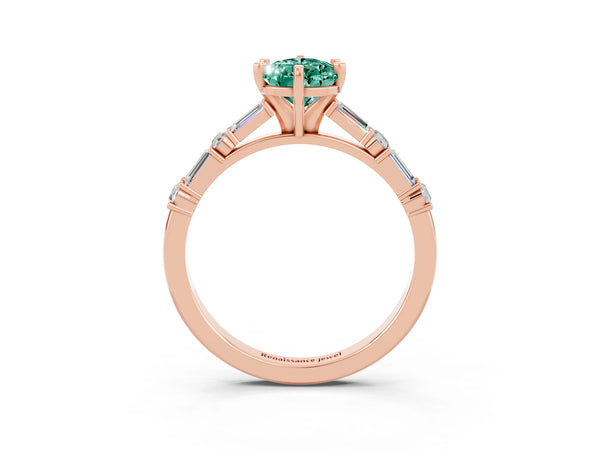 Rose gold Pear Cut Green Sapphire Solitaire with Side Baguettes and Channel Set Band