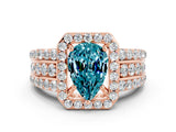 Rose gold Pear Cut Halo Blue Topaz Ring with Split Shank and Four-Prong Setting