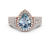 Rose gold Pear Cut Halo Pavé Diamond Engagement Ring with Split Shank and Four-Prong Setting