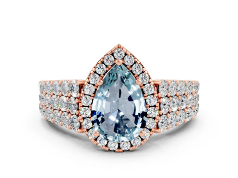 Rose gold Pear Cut Halo Pavé Diamond Engagement Ring with Split Shank and Four-Prong Setting