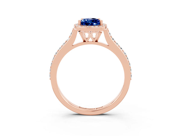 Rose gold Pear Cut Blue Sapphire Halo Engagement Ring with Round Pavé Shoulders and Prong Setting