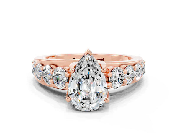 Rose gold Pear Cut Moissanite Engagement Ring with Pavé Band and Four-Prong Setting