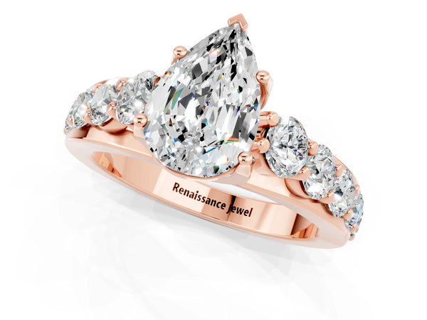 Rose gold Pear Cut Moissanite Engagement Ring with Pavé Band and Four-Prong Setting