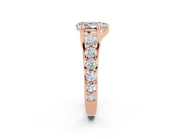 Rose gold Pear Cut Moissanite Engagement Ring with Pavé Band and Four-Prong Setting