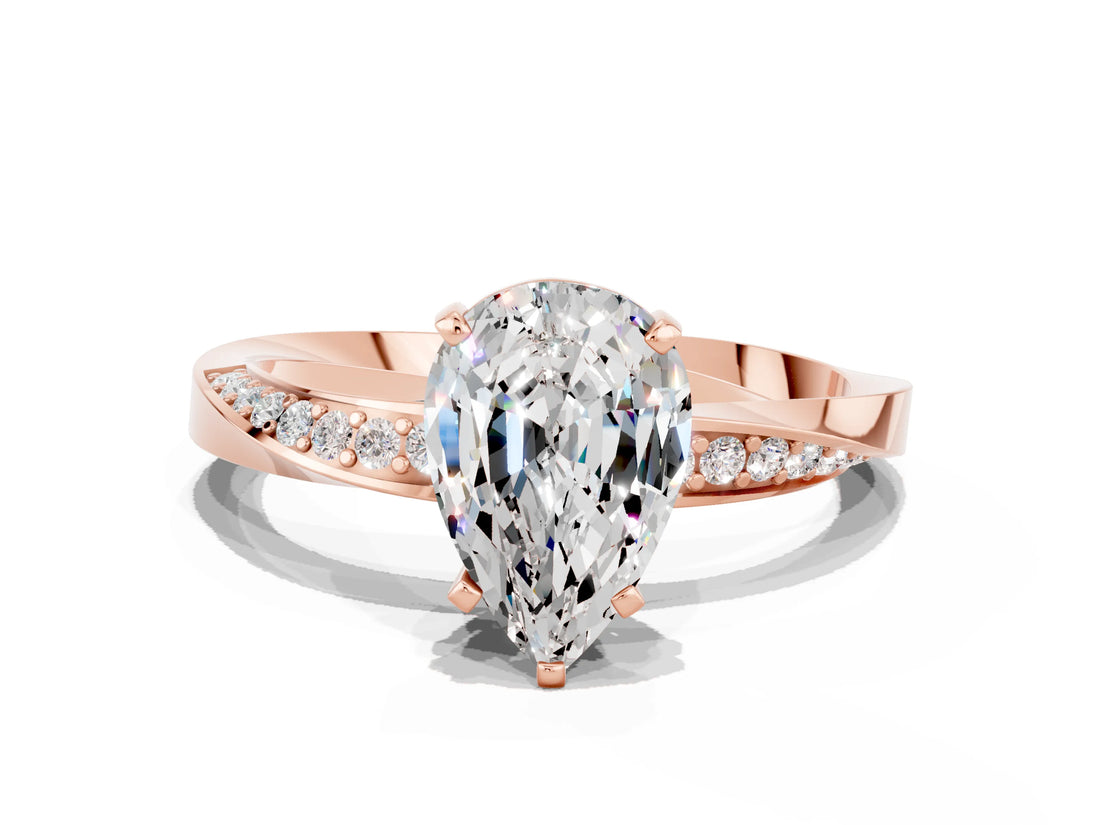 Rose gold Pear Cut Moissanite Engagement Ring with Side Stone Accents and Four-Prong Setting_60