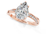Rose gold Pear Cut Moissanite Engagement Ring with Side Stone Accents and Four-Prong Setting_61