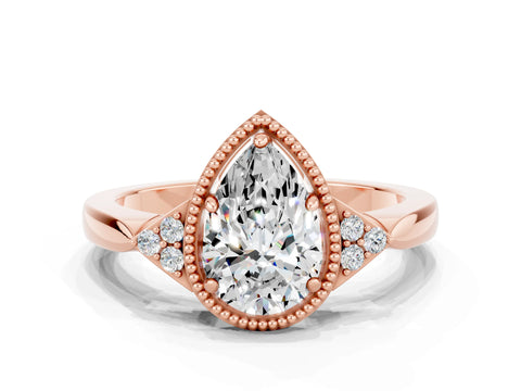 Rose gold Pear Cut Moissanite Halo Ring with Tapered Band and Four-Prong Setting