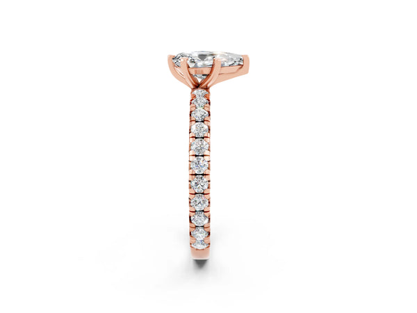 Rose gold Pear Cut Moissanite Pavé Solitaire Ring with Round Band and Prong Setting