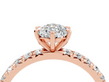 Rose gold Pear Cut Moissanite Pavé Solitaire Ring with Round Band and Prong Setting_28