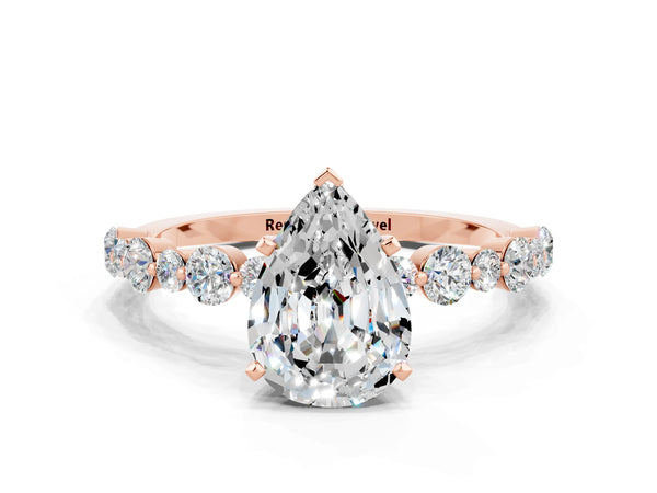 Rose gold Pear Cut Moissanite Prong Set Engagement Ring with Pavé Band