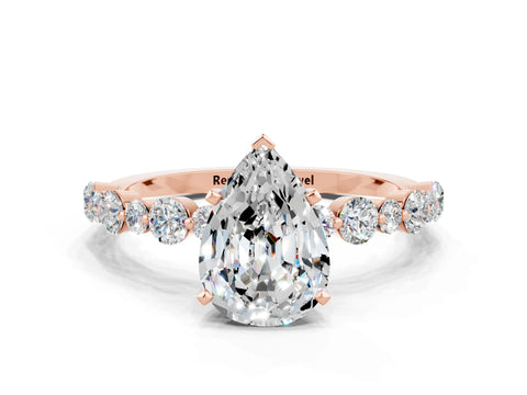 Rose gold Pear Cut Moissanite Prong Set Engagement Ring with Pavé Band