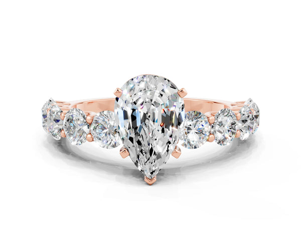 Rose gold Pear Cut Moissanite Prong Setting with Side Stones on a Pave Band