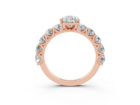 Rose gold Pear Cut Moissanite Prong Setting with Side Stones on a Pave Band_3
