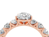 Rose gold Pear Cut Moissanite Prong Setting with Side Stones on a Pave Band_4