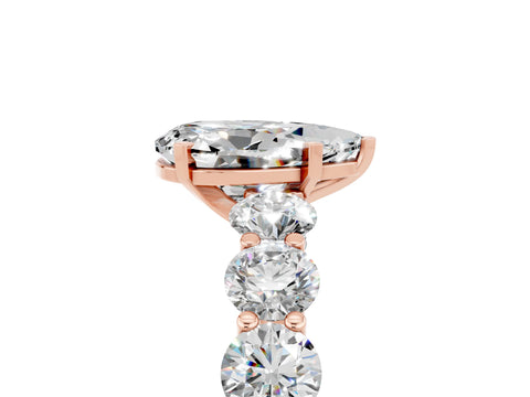 Rose gold Pear Cut Moissanite Prong Setting with Side Stones on a Pave Band_5