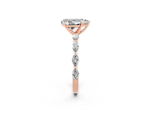 Rose gold Pear Cut Moissanite Ring with Marquise Side Stones and Prong Setting
