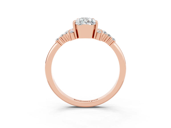 Rose gold Pear Cut Moissanite Ring with Side Stones and Four-Prong Setting
