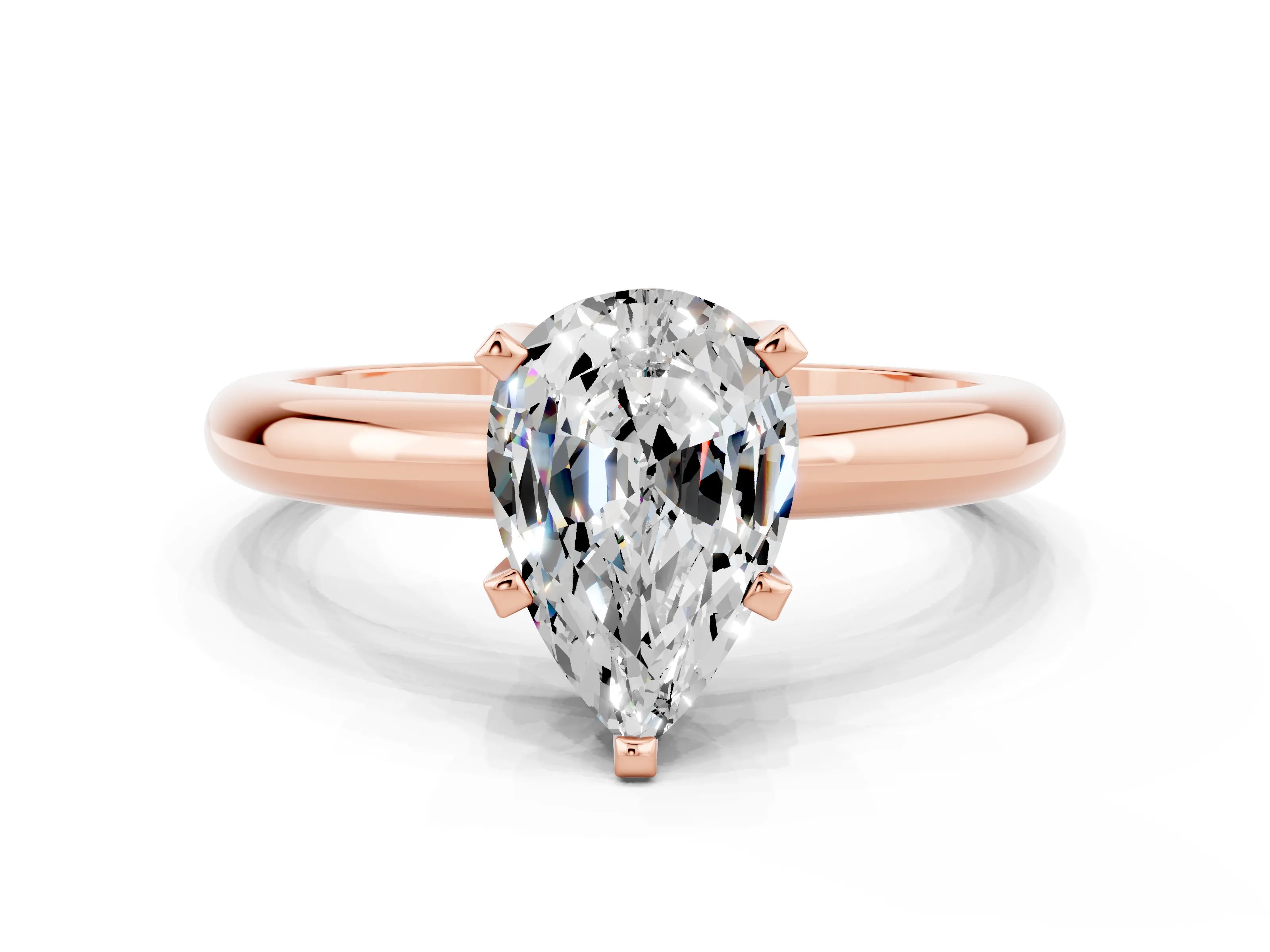 Rose gold Pear Cut Moissanite Solitaire Engagement Ring with Round Band and Four-Prong Setting