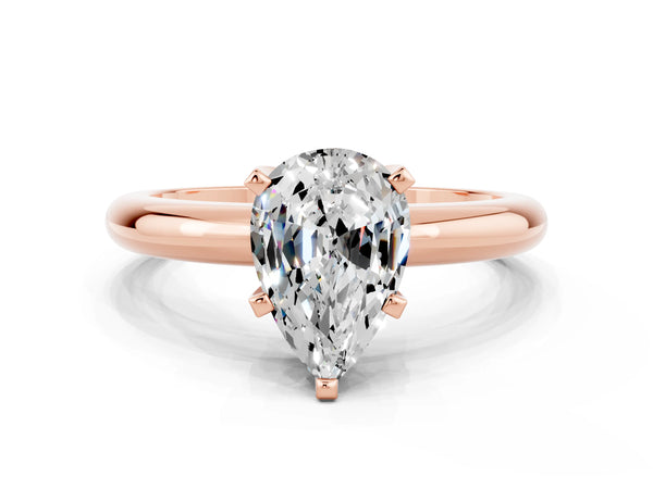 Rose gold Pear Cut Moissanite Solitaire Engagement Ring with Round Band and Four-Prong Setting